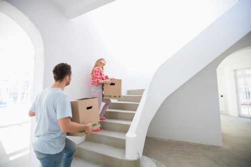 Furniture and boxes being loaded by house removalists in Kensington