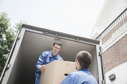 Careful loading of household furniture for removal services in Kensington
