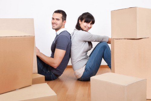 Loading furniture into a van near Kensington residential streets