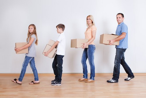 Load-based and cubic-yard quote options for a Kensington man and van move